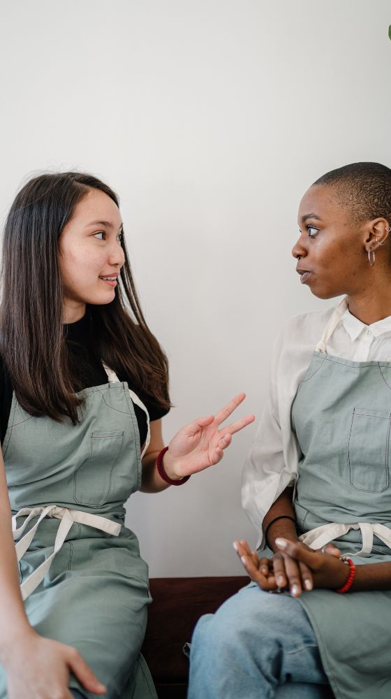 Two women communicating