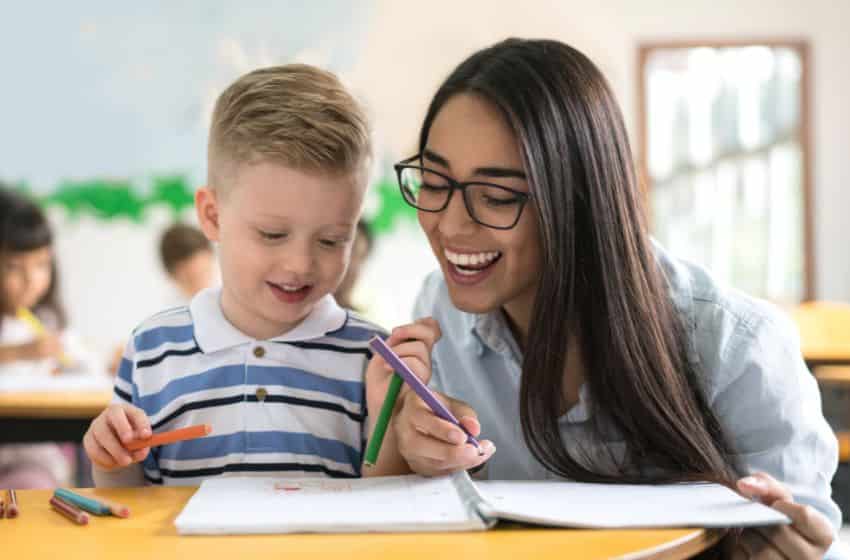 Teacher one on one with young learner